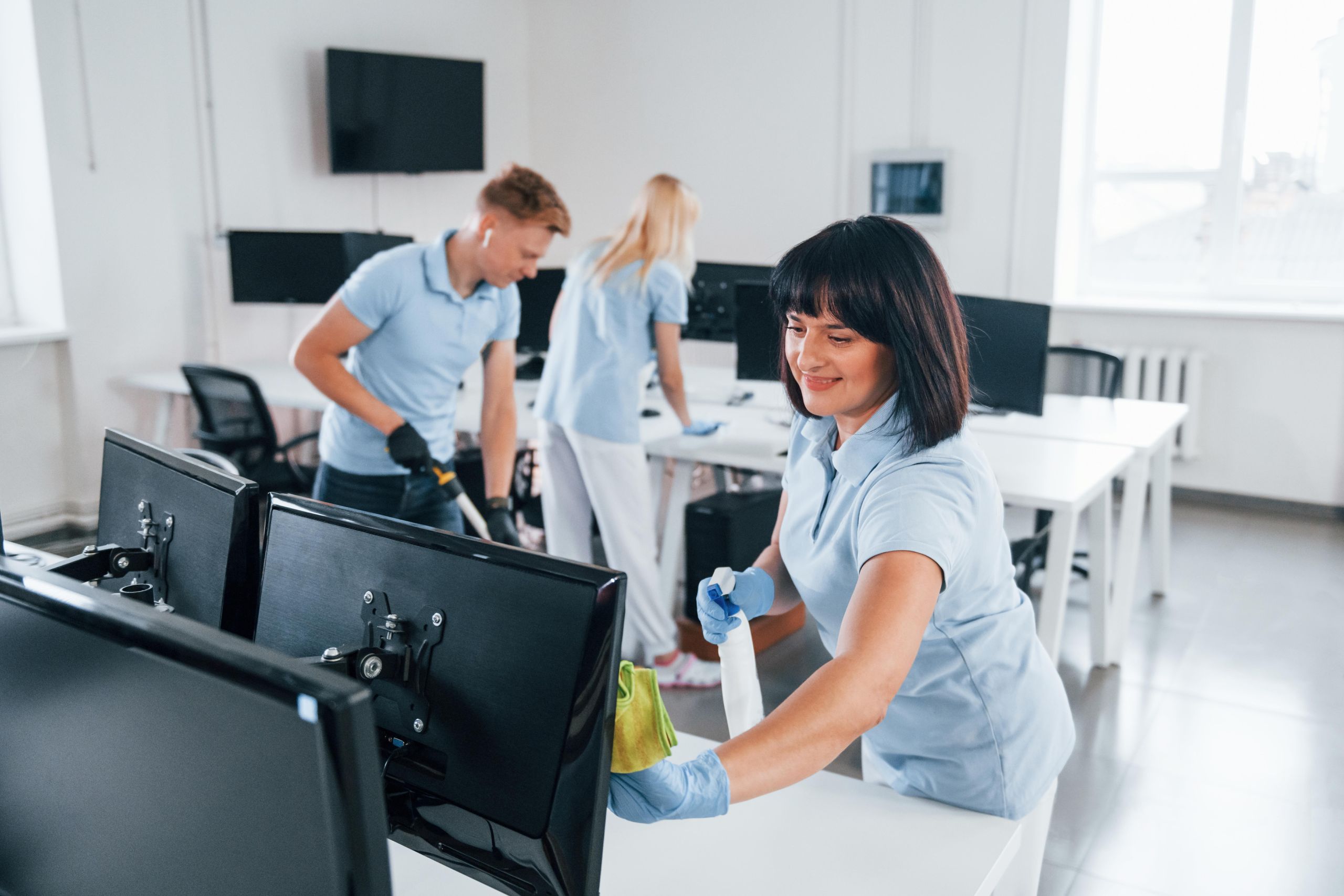 Team cleaning an office workspace in Asheville